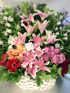 Pink basket arrangement with summer flavor!!! (grouped flowers)