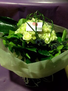 (41) white roses A' quality Dutch with greens gift wrapped.