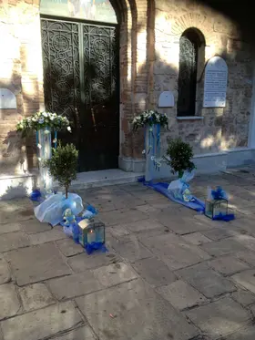 Arrow  shaped arrangements , Olive Plants (balls) and Candles