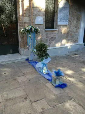 Arrow  shaped arrangements , Olive Plants (balls) and Candles