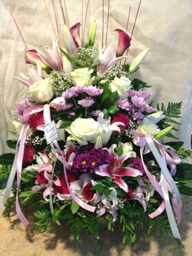 Basket arrangement  with pink season summer flowers. Special !