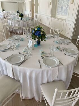 Wedding Flower Reception Decoration.Tables By the Pool or Sea.