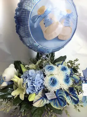 Arrangement of flowers for new born baby