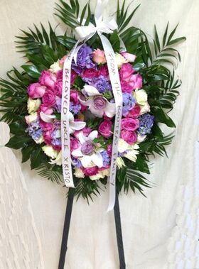 Funeral wreath on "oasis moss standing  base" with exclusive flowers.