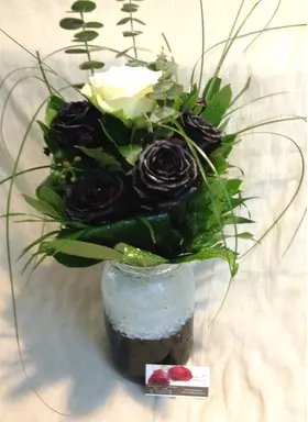 Roses black (9) stems arrangement in vase. Dyed.