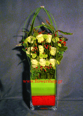 Arrangement with roses in glass vase