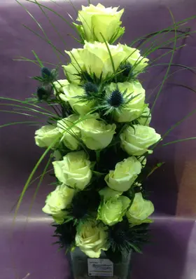 Arrangement in glass vase with white flowers & colored decorative sand!!!