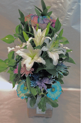 Arrangement in glass vase with white flowers & colored decorative sand!!!
