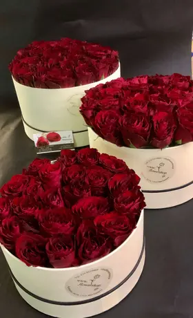 Roses in decorative  "Set of 3" HatBoxes.