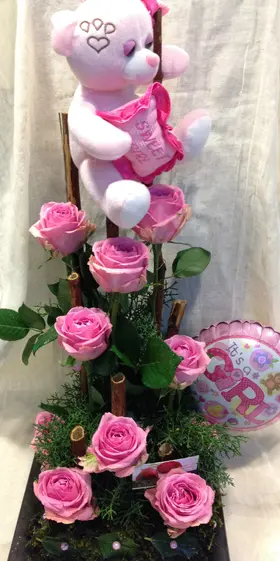 Roses and snake grass (baboo) in vertical parallel arrangement