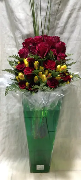 Exclusive Ecuador Roses 60+  stems in Heavy Clear Pyramid Glass Vase (height +70cm).