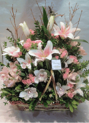 Basket flower arrangement for new born baby