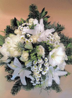 White flowers and christmas greens