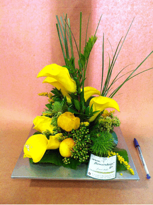 Season flowers arrangement in metal tray