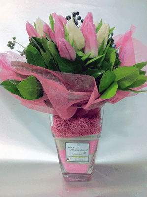 Tulips (20) stems in glass vase with decorative sand layers!!! Pinky.