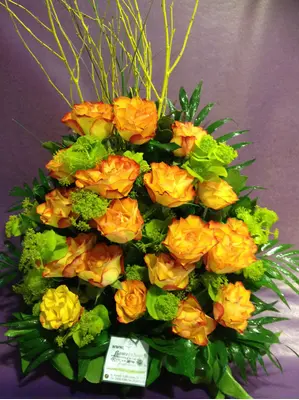 (21) orange - salmon  roses A' quality Dutch with greens in basket.