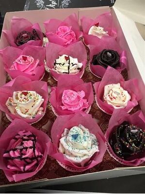 (12) Exclusive Waxed Cupcakes or Chocolate Roses