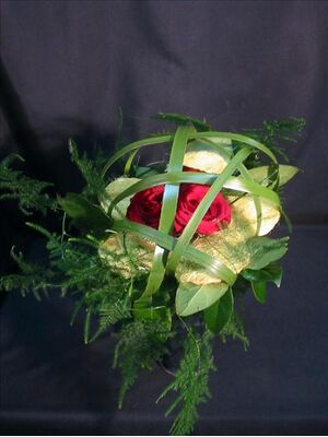 Bouquet with roses and typha.