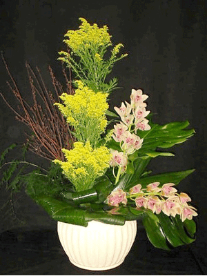 Grouped flowers in big ceramic pot
