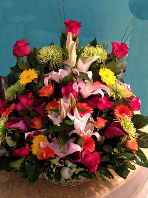 Basket arrangement  with season summer flowers
