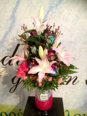 Flower arrangement in glass cube  vase