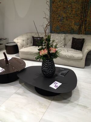 Exclusive arrangement in design vase. (flowers selected upon season and theme)