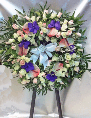 Funeral wreath on "oasis moss standing  base"