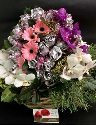 Exclusive "Ball Shape" arrangement in basket. Yacht Flower Services.