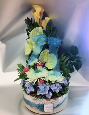 Beach of flowers in cylinder glass jar