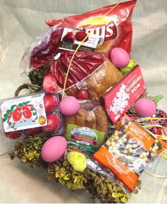 Basket with Easter Gourmet Delicacies