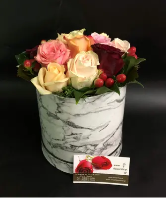 Roses in decorative  15 cm χ 15 cm  "Divine  Hatbox". (7) heads.