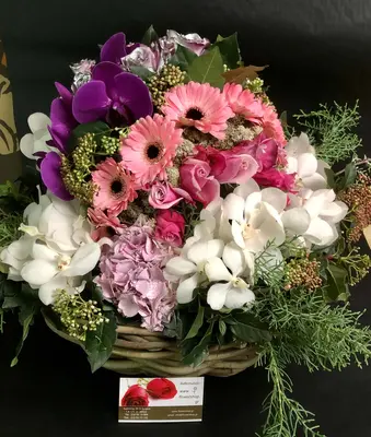 Exclusive "Ball Shape" arrangement in basket. Yacht Flower Services.