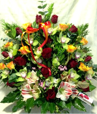Basket with roses and cymbidium orchids