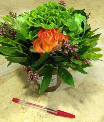 Hydrangea flower arrangement in small "Artstone" pot