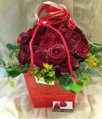 Roses (31) stems bouquet in water resistant  bag . Red Passion & Love.