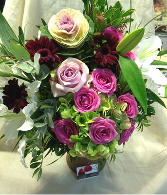 Bouquet with red and pink seasonal flowers.Special.