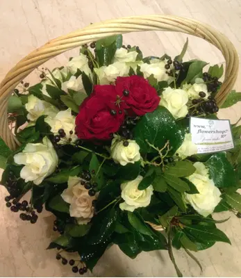 Basket  with white roses & (2) "lover" reds in the center
