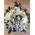 White flowers and christmas greens