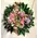 White or pink condolences wreath.