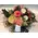 Flowers & dried oak leaves in basket. Autumn flavor arrangement.