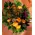 Flower arrangement in small basket with autumn flavor.Salmon colors!Special