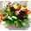 Flower arrangement in small basket with autumn flavor