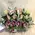 Christmas arrangement in basket with candles