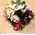 Exclusive season flowers in glass tray arrangement