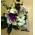 Exclusive season flowers in glass tray arrangement