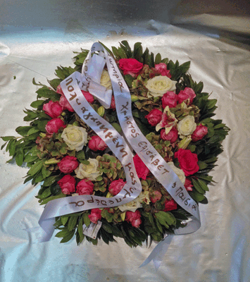 Funeral wreath on "oasis moss base"