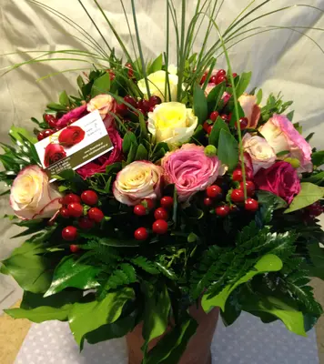 (21) orange - salmon  roses A' quality Dutch or Ecuador with greens gift wrapped.