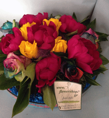 Flower arrangement in glass tray with autumn flavor