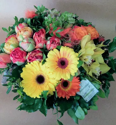 Multi colored flowers in basket