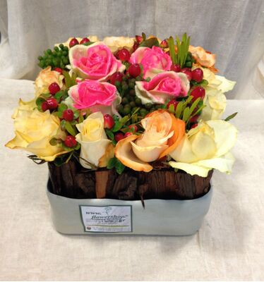 Exclusive Waxed Roses arrangement in pot